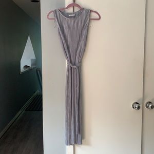 Light fabric but satin feel. Size Medium